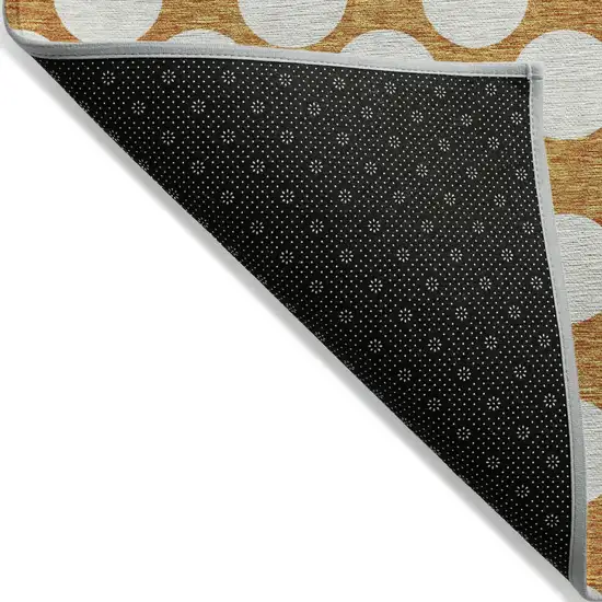 Orange And Ivory Polka Dot Washable Indoor Outdoor Area Rug Photo 4