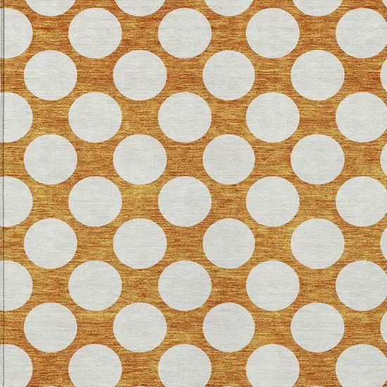 Orange And Ivory Polka Dot Washable Indoor Outdoor Area Rug Photo 6