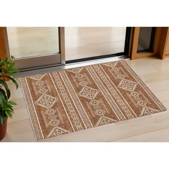 Orange And Ivory Southwestern Washable Indoor Outdoor Area Rug Photo 1
