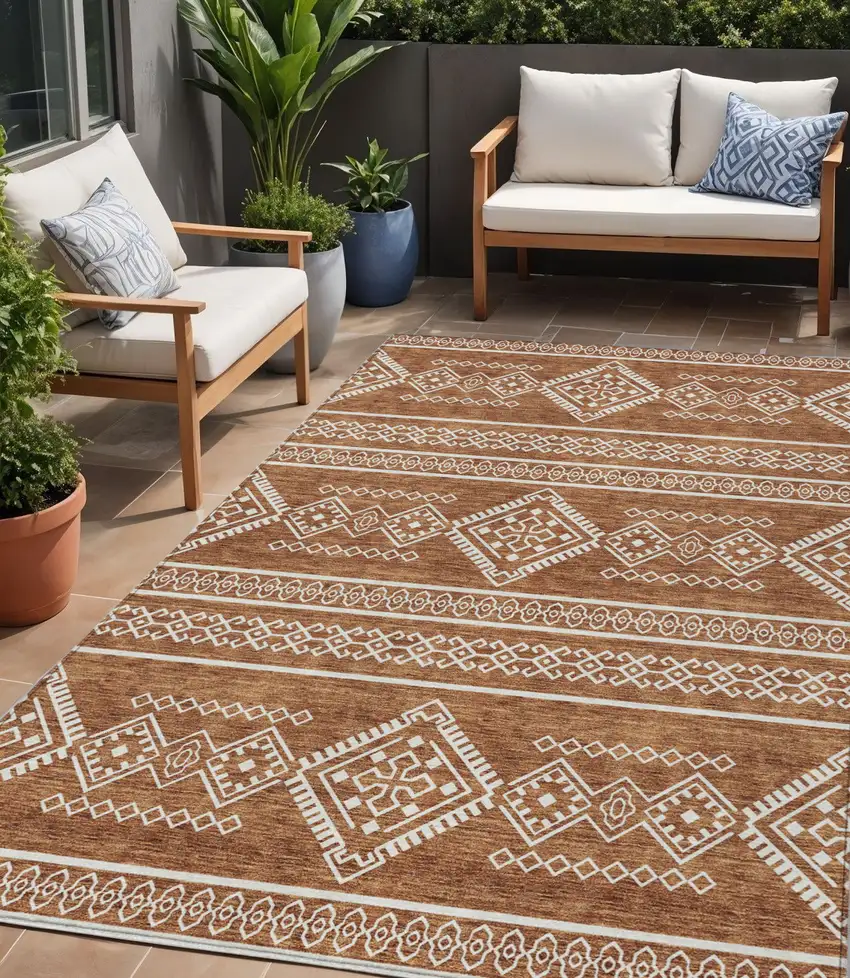 Orange And Ivory Southwestern Washable Indoor Outdoor Area Rug Photo 1