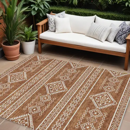Orange And Ivory Southwestern Washable Indoor Outdoor Area Rug Photo 1