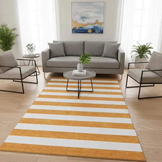 Orange And Ivory Striped Washable Area Rug With UV Protection Photo 2