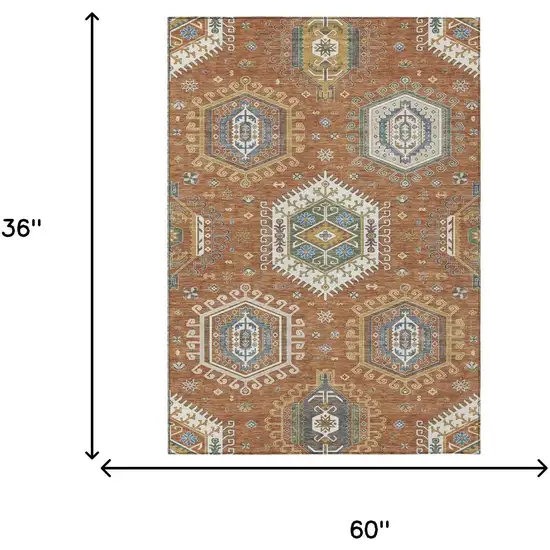 Orange And Ivory Tribal Washable Indoor Outdoor Area Rug Photo 5