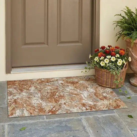 Orange And Khaki Abstract Washable Indoor Outdoor Area Rug Photo 1