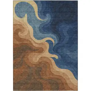 Photo of Orange And Navy Blue Abstract Washable Indoor Outdoor Area Rug