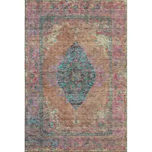 Photo of Orange And Pink Medallion Washable Area Rug With UV Protection