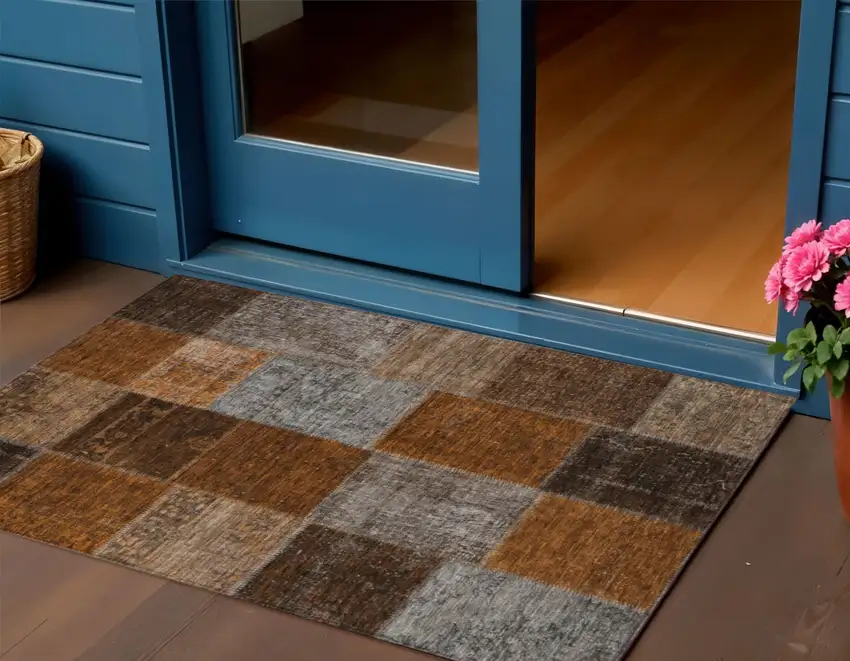 Orange And Taupe Patchwork Washable Indoor Outdoor Area Rug Photo 1