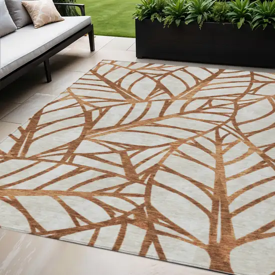 Orange Beige And Copper Floral Washable Indoor Outdoor Area Rug Photo 1