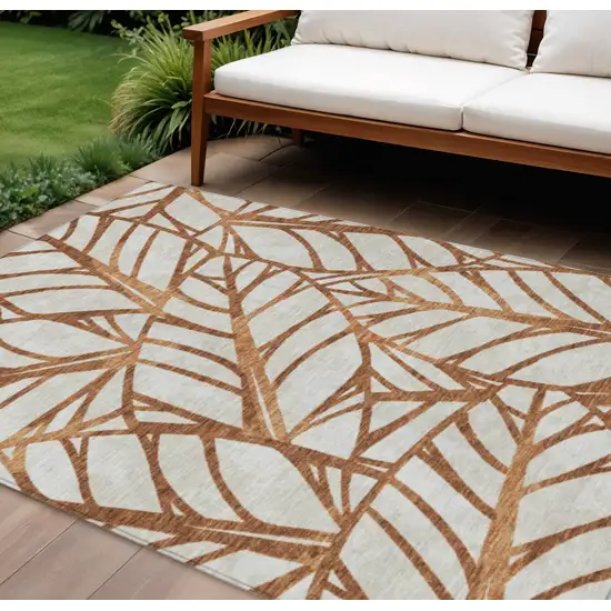 Orange Beige And Copper Floral Washable Indoor Outdoor Area Rug Photo 1