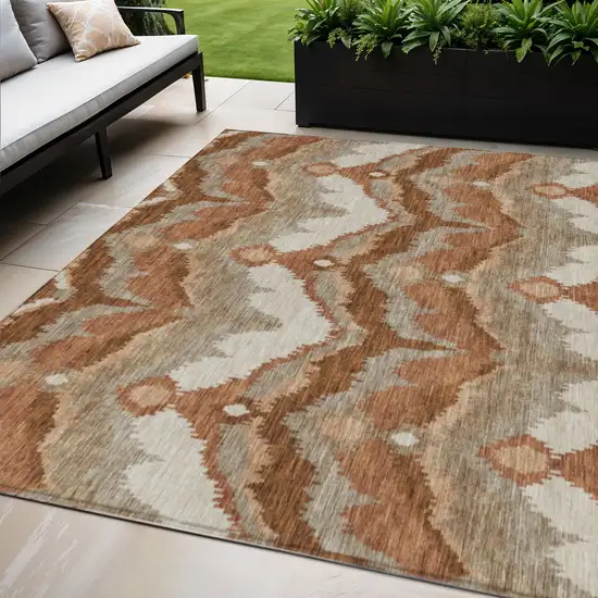 Orange Beige And Copper Ikat Washable Indoor Outdoor Area Rug Photo 1
