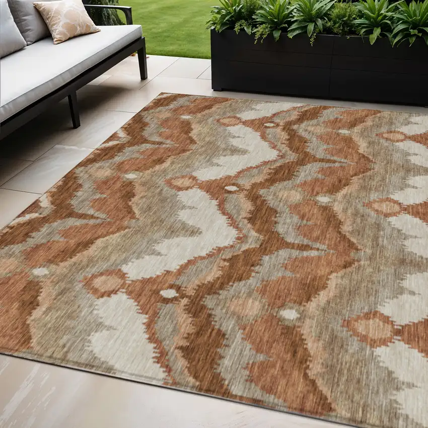 Orange Beige And Copper Ikat Washable Indoor Outdoor Area Rug Photo 1
