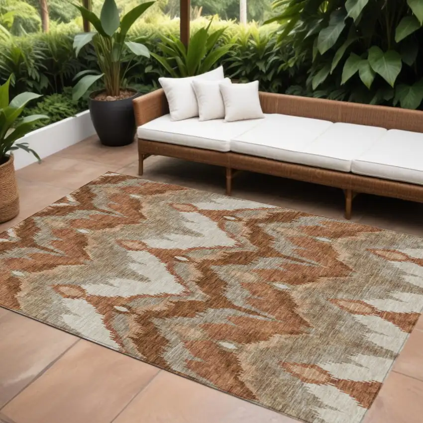Orange Beige And Copper Ikat Washable Indoor Outdoor Area Rug Photo 1