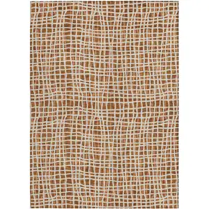 Photo of Orange Beige And Copper Striped Washable Indoor Outdoor Area Rug