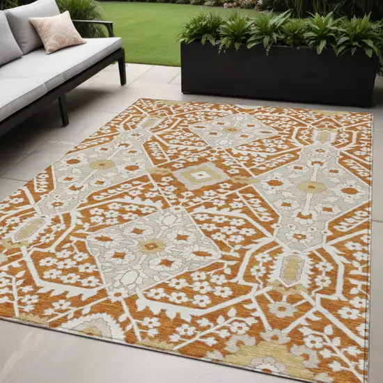 Orange Beige And Gold Floral Washable Indoor Outdoor Area Rug Photo 1