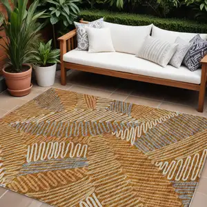 Photo of Orange Beige And Gray Floral Washable Indoor Outdoor Area Rug