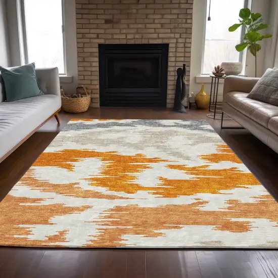 Orange Beige And Ivory Abstract Washable Indoor Outdoor Area Rug Photo 8