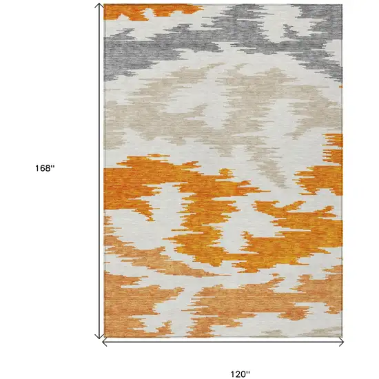 Orange Beige And Ivory Abstract Washable Indoor Outdoor Area Rug Photo 7