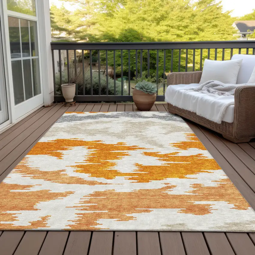 Orange Beige And Ivory Abstract Washable Indoor Outdoor Area Rug Photo 7