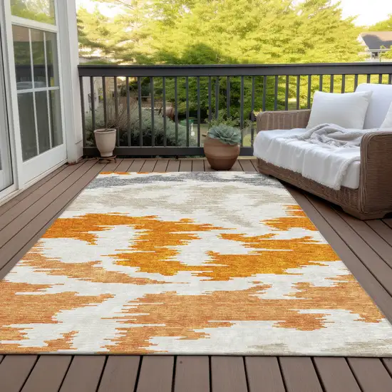 Orange Beige And Ivory Abstract Washable Indoor Outdoor Area Rug Photo 7
