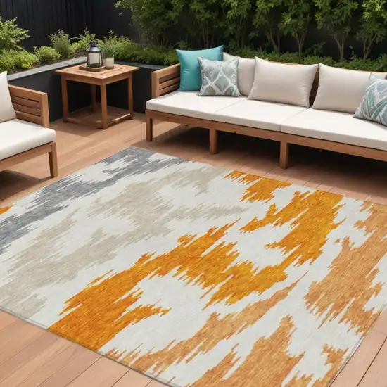 Orange Beige And Ivory Abstract Washable Indoor Outdoor Area Rug Photo 2