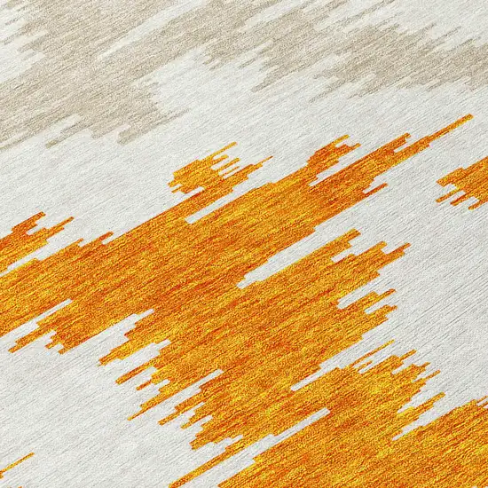 Orange Beige And Ivory Abstract Washable Indoor Outdoor Area Rug Photo 8