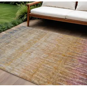 Photo of Orange Blue And Beige Abstract Washable Indoor Outdoor Area Rug