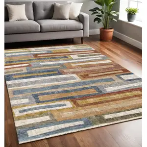 Photo of Orange Blue And Beige Geometric Area Rug