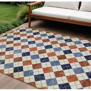 Photo of Orange Blue And Ivory Geometric Washable Indoor Outdoor Area Rug