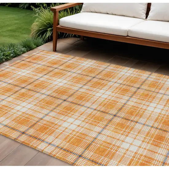 Orange Blue And Ivory Plaid Washable Indoor Outdoor Area Rug Photo 1