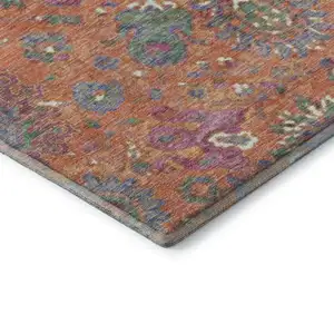 Photo of Orange Blue And Pink Oriental Washable Area Rug With UV Protection