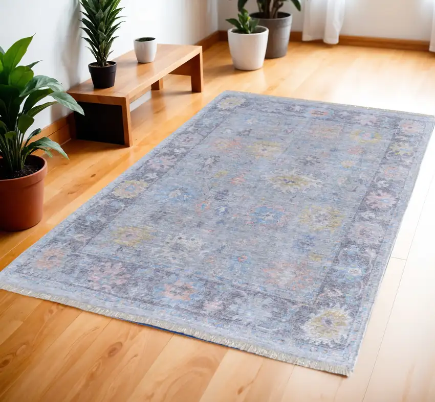 Orange Blue and Gold Floral Hand Woven Distressed Area Rug With Fringe Photo 1