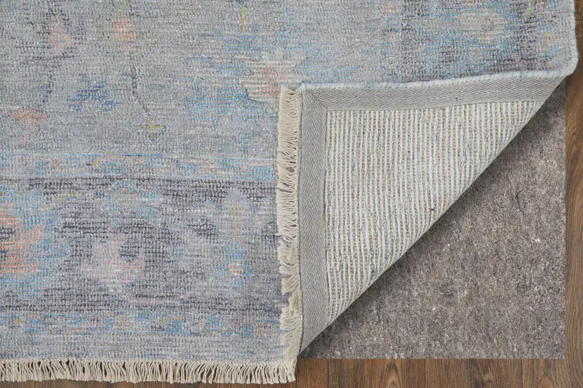 Orange Blue and Gold Floral Hand Woven Distressed Area Rug With Fringe Photo 9