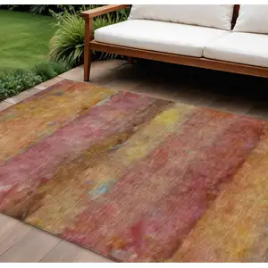 Photo of Orange Blush And Yellow Abstract Washable Indoor Outdoor Area Rug