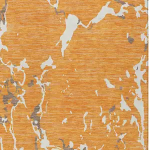Photo of Orange Brown And Ivory Striped Washable Indoor Outdoor Area Rug