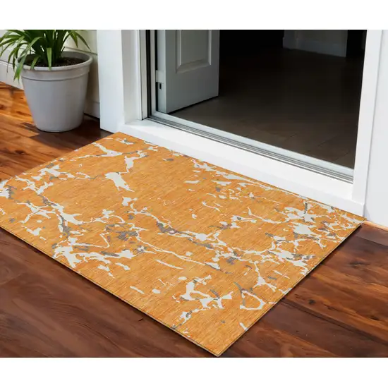 Orange Brown And Ivory Striped Washable Indoor Outdoor Area Rug Photo 1