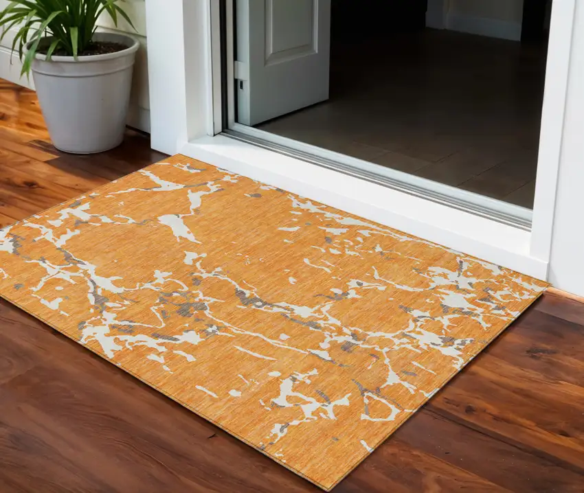 Orange Brown And Ivory Striped Washable Indoor Outdoor Area Rug Photo 1