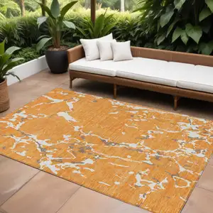 Photo of Orange Brown And Ivory Striped Washable Indoor Outdoor Area Rug