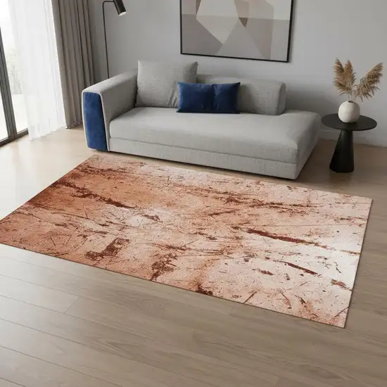 Orange Brown And White Abstract Washable Area Rug With UV Protection Photo 1