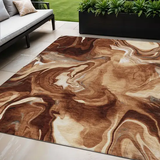 Orange Copper And Ivory Abstract Washable Indoor Outdoor Area Rug Photo 1