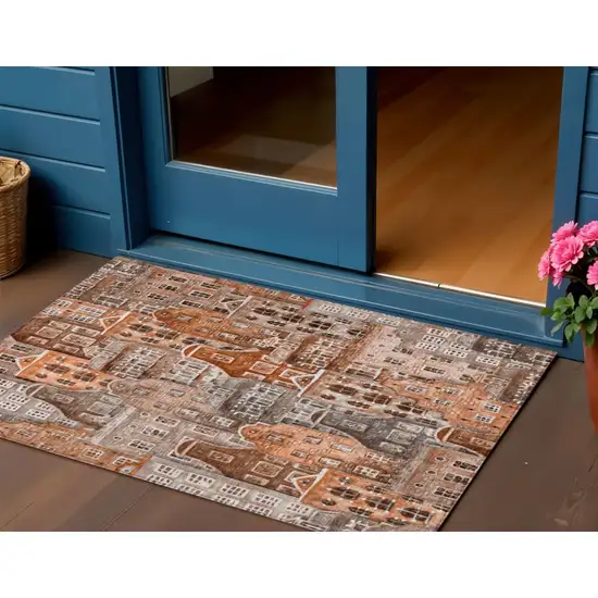 Orange Copper And Salmon Village Houses Washable Indoor Outdoor Area Rug Photo 1