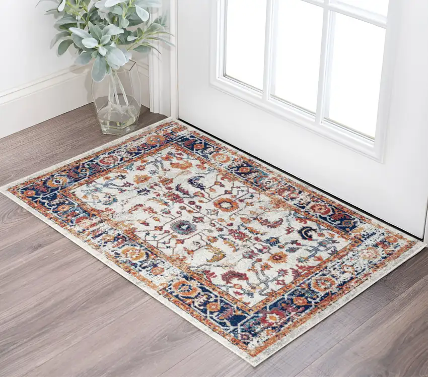 Ivory Navy and Orange Floral Power Loom Area Rug Photo 1