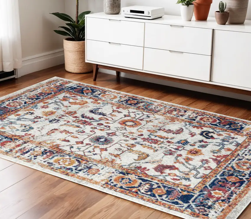 Ivory Navy and Orange Floral Power Loom Area Rug Photo 1
