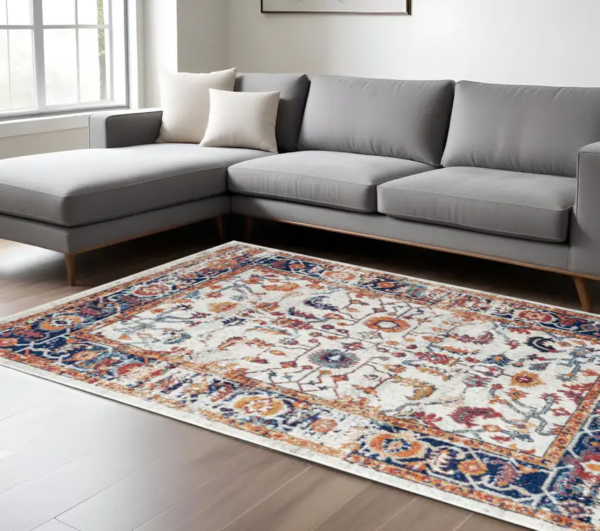 Ivory Navy and Orange Floral Power Loom Area Rug Photo 1
