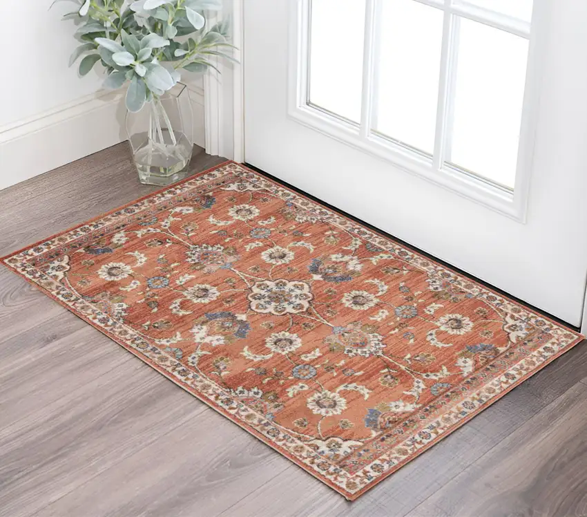 Ivory Blue and Orange Floral Power Loom Area Rug Photo 1