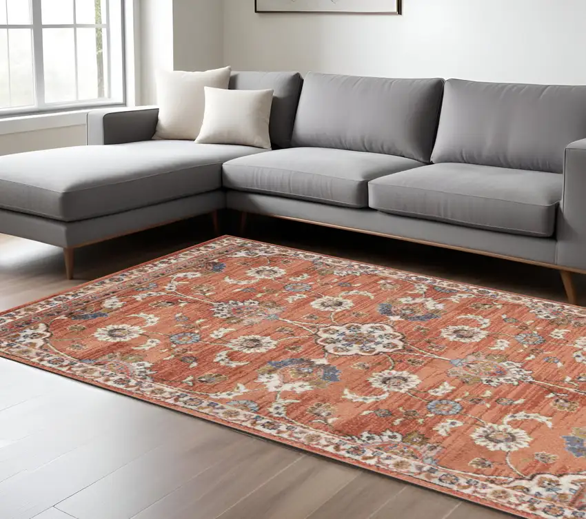 Ivory Blue and Orange Floral Power Loom Area Rug Photo 1