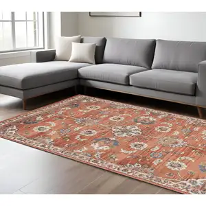 Photo of Orange Floral Power Loom Area Rug