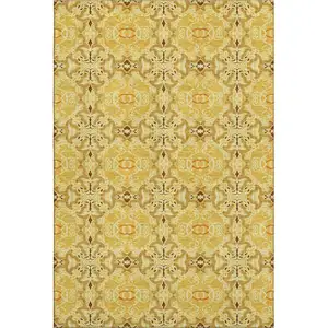 Photo of Orange Gold And Ivory Medallion Washable Area Rug With UV Protection