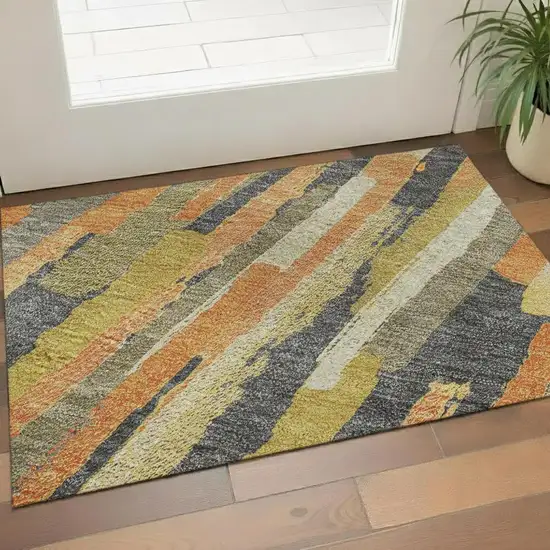 Orange Gold And Ivory Striped Washable Area Rug With UV Protection Photo 2