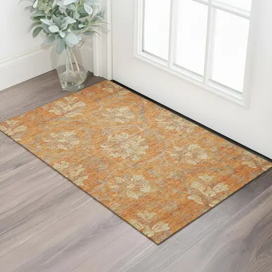 Orange Gray And Beige Floral Washable Area Rug With UV Protection Photo 1