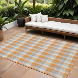 Photo of Orange Gray And Beige Plaid Washable Indoor Outdoor Area Rug